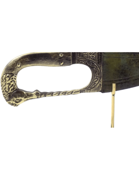 Espada larga de bronce o Kopis macedonio, grabados y pomo con cabeza de caballo