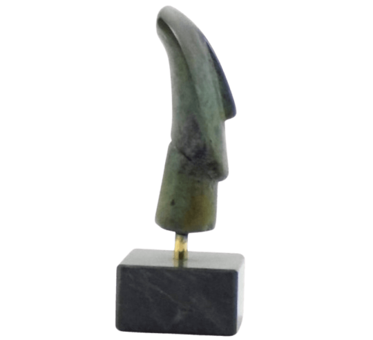 Cabeza de ídolo femenino en bronce, tipo...