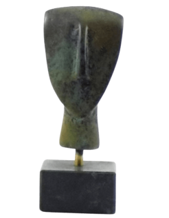 Cabeza de ídolo femenino en bronce, tipo Spédos,...
