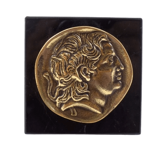 Pisapapeles, moneda de bronce con la efigie de Alejandro Magno, octodracma de la antigua Grecia