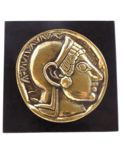 Pisapapeles, moneda en bronce con la efigie de Alejandro...