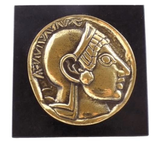 Pisapapeles, moneda en bronce con la efigie de Alejandro Magno con casco, octodracma de la antigua Grecia