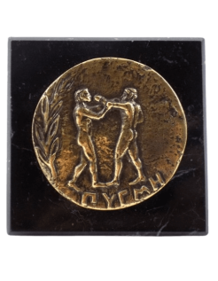 Paperweight, bronze coin featuring the effigy of the...