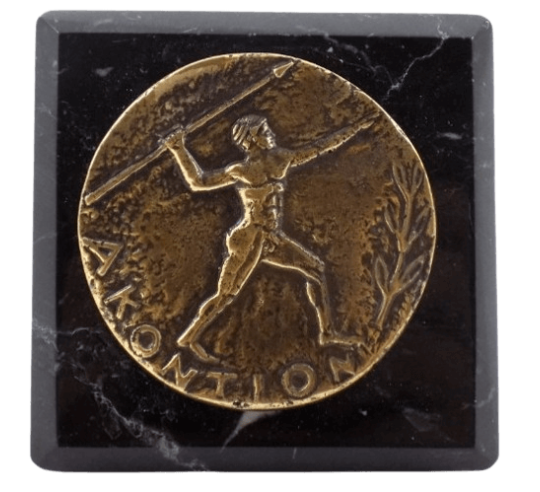 Paperweight, bronze coin featuring the Javelin Thrower, Athens Olympic Games
