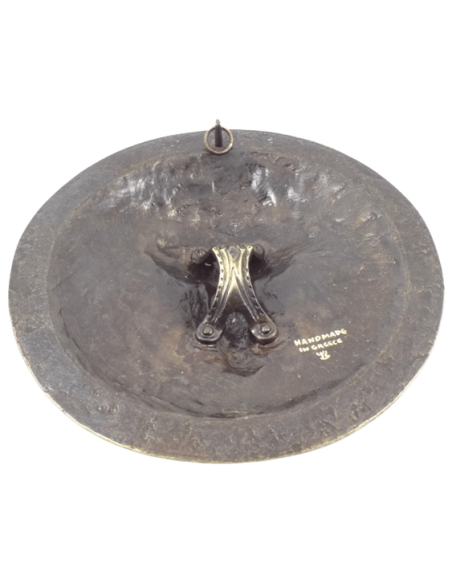 Escudo de bronce adornado con el rostro de Medusa, símbolo de protección contra los enemigos y el mal