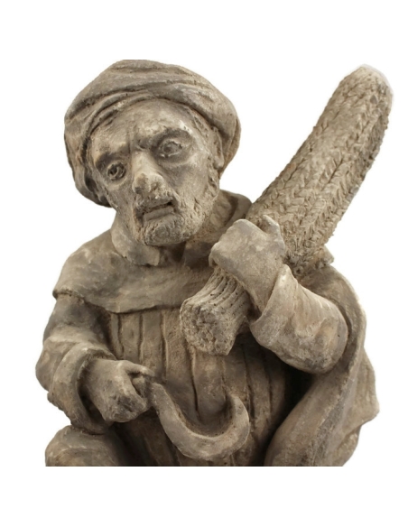 Gargouille récoltant son blé