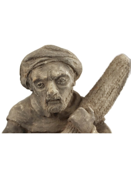 Gargouille récoltant son blé