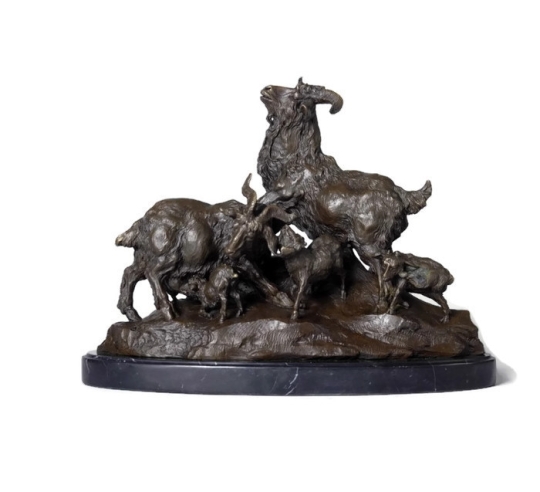 Goat and its kittens by Miguel Fernando Lopez (Milo)