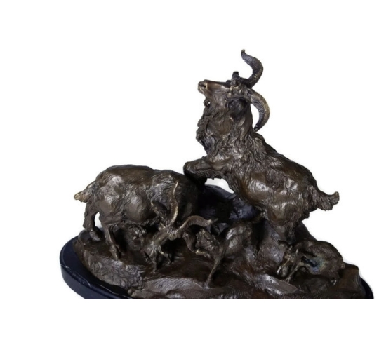 Goat and its kittens by Miguel Fernando Lopez (Milo)