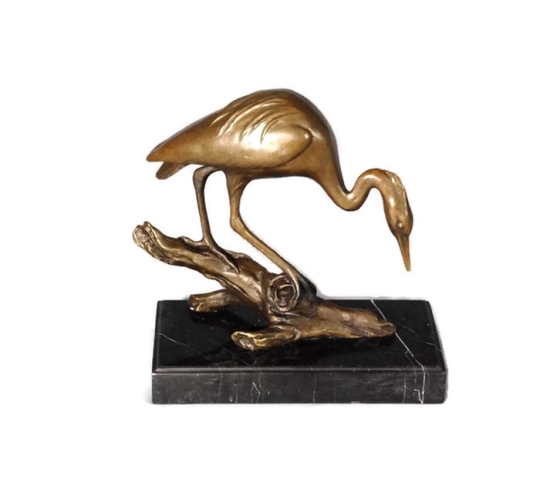 Heron fishing for food by Miguel Fernando López (Milo)