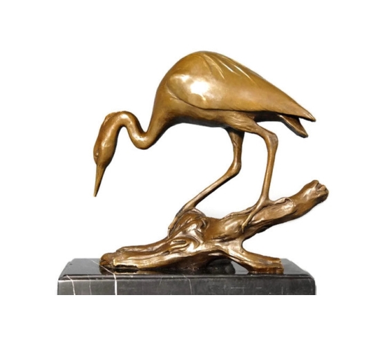 Heron fishing for food by Miguel Fernando López (Milo)