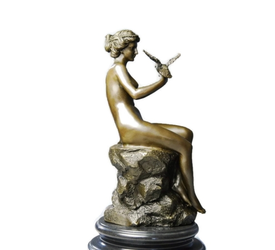 Young woman naked with dove by Ferdinand Preiss