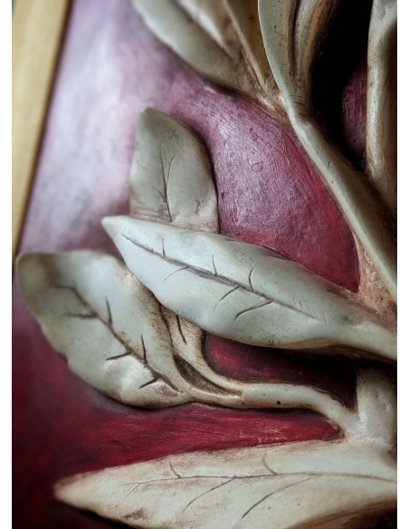 Rama de melocotonero cargada de frutas