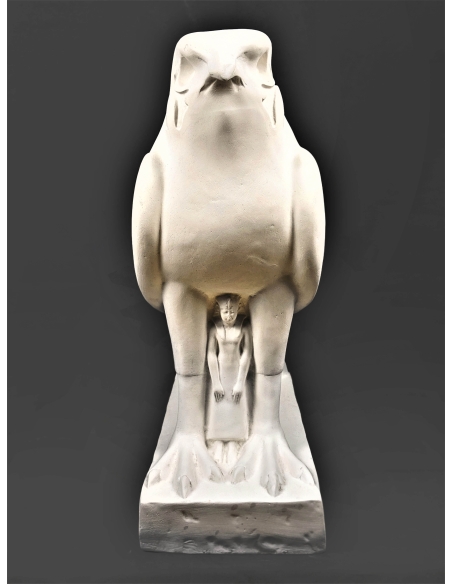 Statue of King Nectanebo II protected by Horus