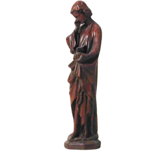 Statue of St. John the Evangelist reading the Bible
