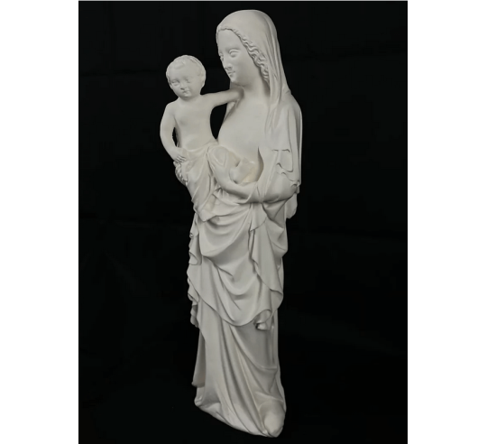 Estatua de la Virgen con el niño por Juan de Lieja