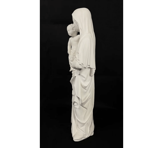 Estatua de la Virgen con el niño por Juan de Lieja