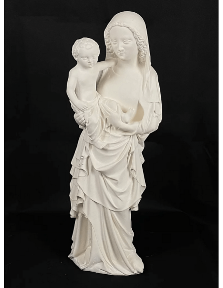 Estatua de la Virgen con el niño por Juan de Lieja