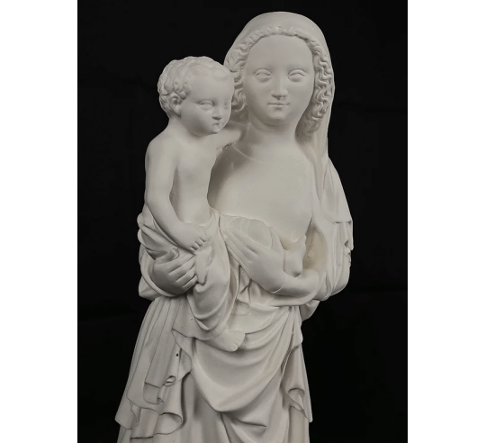 Estatua de la Virgen con el niño por Juan de Lieja