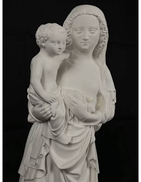 Estatua de la Virgen con el niño por Juan de Lieja