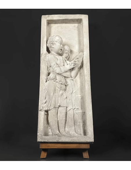 Bas relief angels singing Bible verses - left side Bas relief angels singing Bible verses - left side
