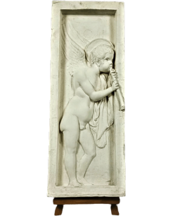Bas relief angel playing flute - left side
