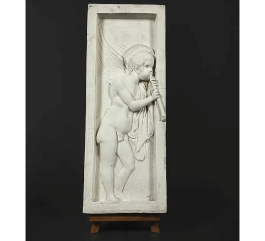 Bas relief angel playing flute - left side