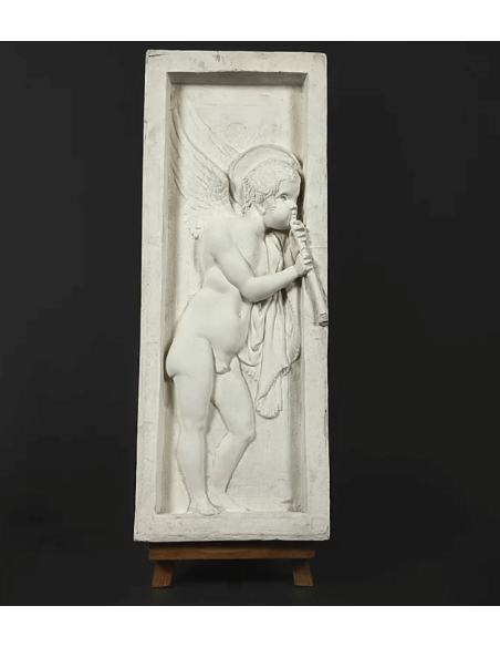Bajorrelieve de ángel tocando la flauta - lado izquierdo Bajorrelieve de ángel tocando la flauta - lado izquierdo