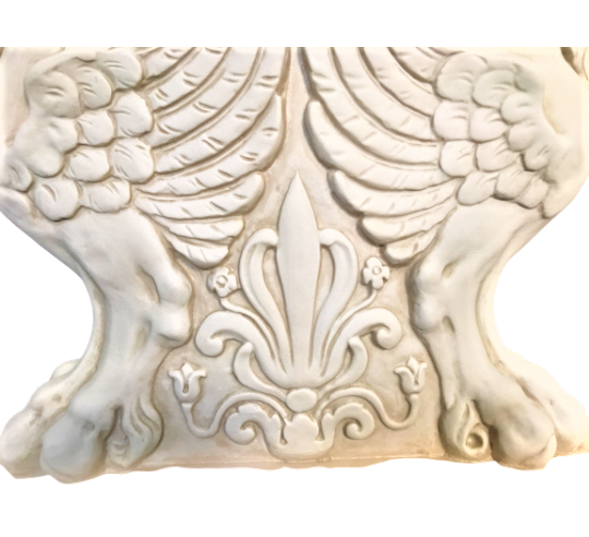 Table base representing a winged lion