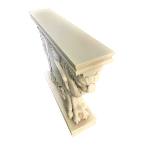 Table base representing a winged lion