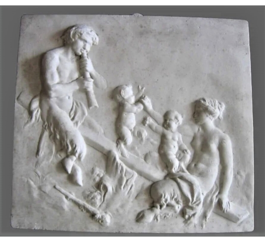 Bas relief couple de faunes jouant avec...
