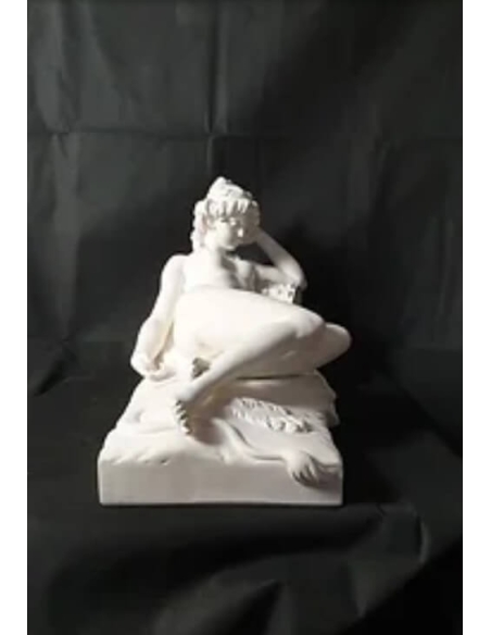 Statue of a nude woman lying on a lion skin by Claude Michel called Clodion