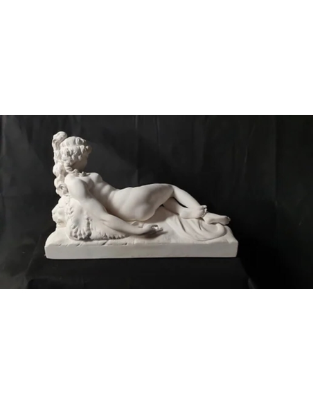 Statue of a nude woman lying on a lion skin by Claude Michel called Clodion