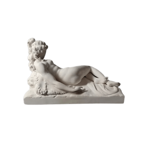 Statue of a nude woman lying on a lion skin by...