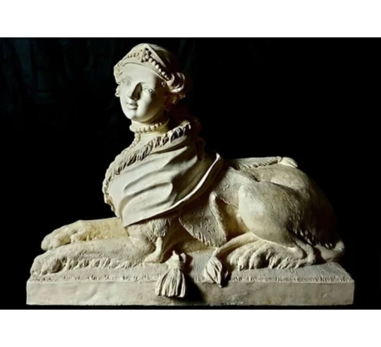 Neoclassical-style Female Sphinx Statue facing...
