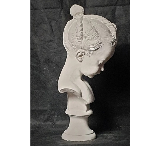 Bust of a little girl with pigtails called the...