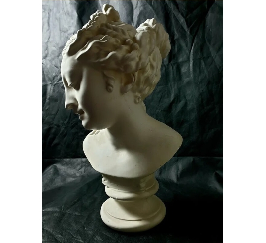 Bust of Venus leaving the bath after...