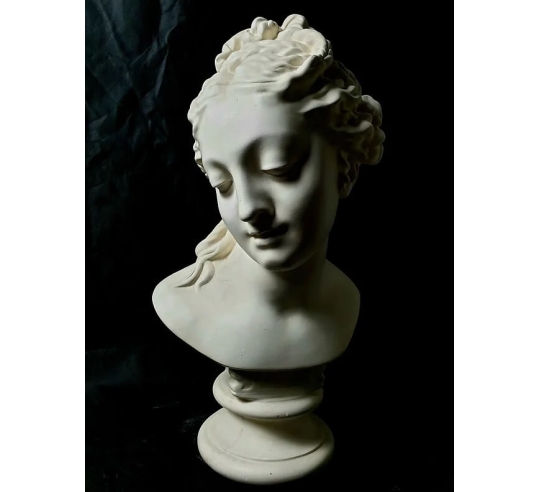 Bust of Venus leaving the bath after...