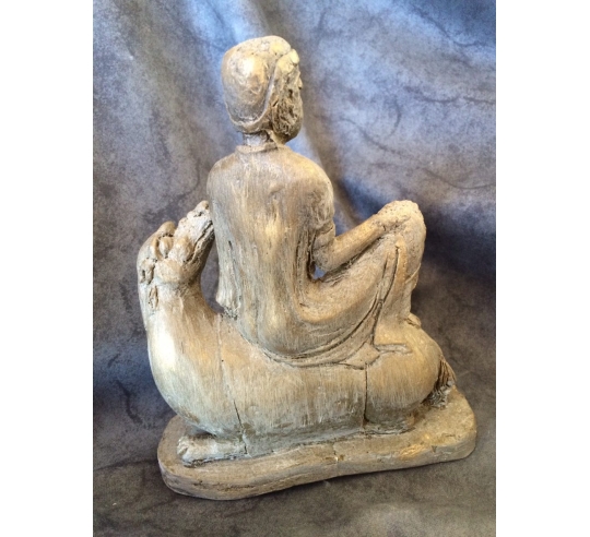 Hombre montado a camello