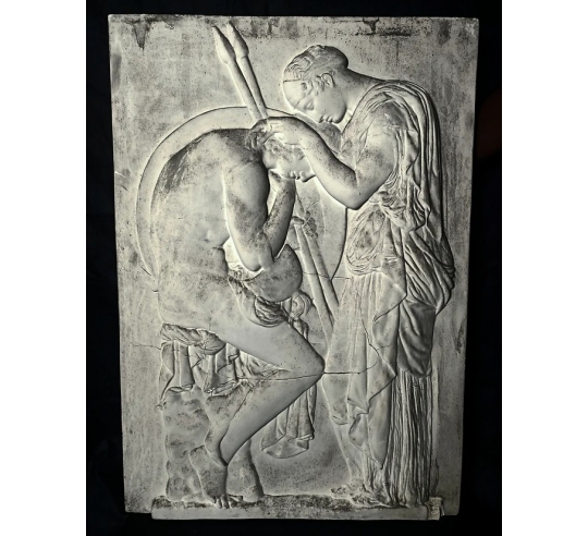 Low relief of Ethra or Æthra weeping over the...