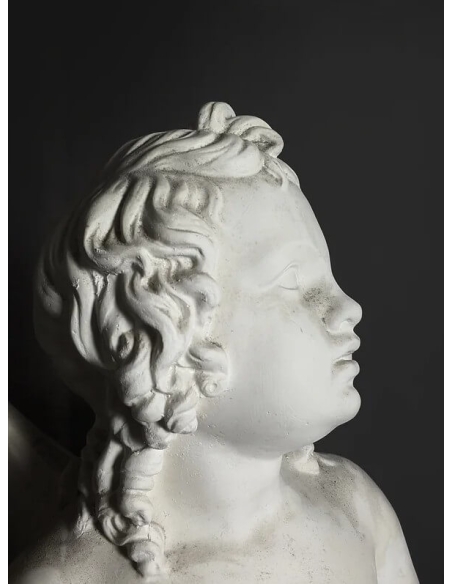 Statue de Cupidon avec son arc ou Amorino d'après Bertel Thorvaldsen