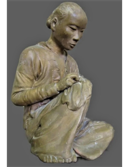 Statue of an Annamite seamstress after Félix Delteil