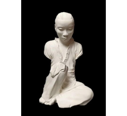 Statue of an Annamite seamstress after Félix...