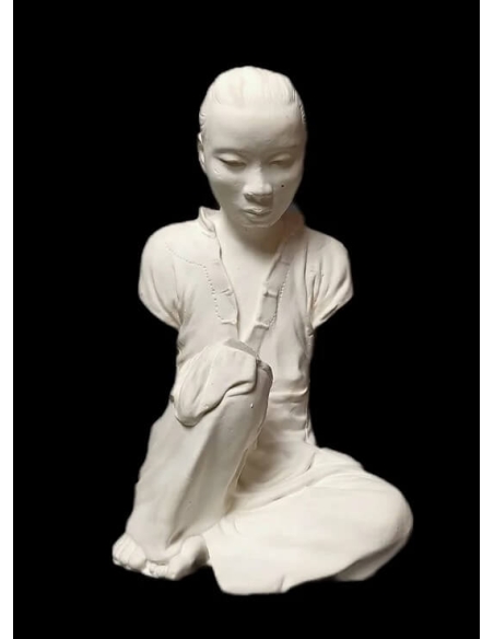 Statue of an Annamite seamstress after Félix Delteil