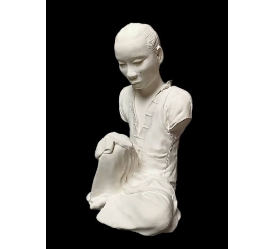 Statue of an Annamite seamstress after Félix...