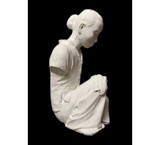 Statue of an Annamite seamstress after Félix...