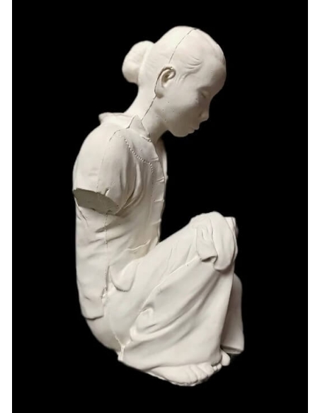 Statue of an Annamite seamstress after Félix Delteil