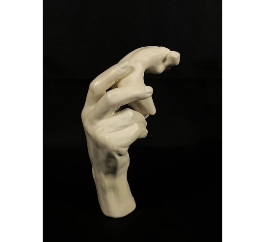Sculpture of Rodin's Hand holding a female...