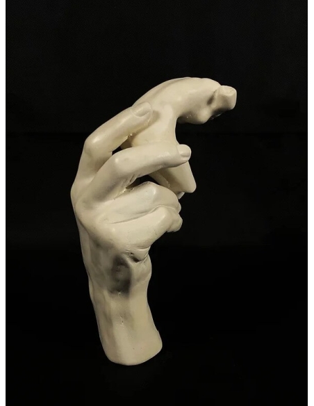Sculpture of Rodin's Hand holding a female torso after Auguste Rodin