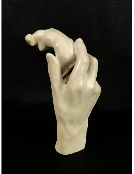 Sculpture of Rodin's Hand holding a female torso after Auguste Rodin